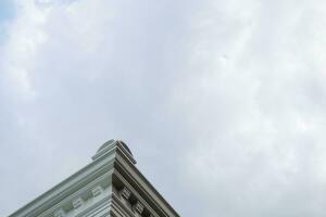 Building ballroom with cloudy sky background. photo