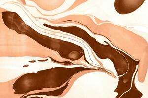 The texture of marble. Abstract background, made in the technique of fluid art. Demonstrating the colors of 2024 - Peach Fuzz. photo