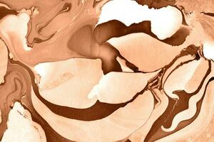 The texture of marble. Abstract background, made in the technique of fluid art. Demonstrating the colors of 2024 - Peach Fuzz. photo