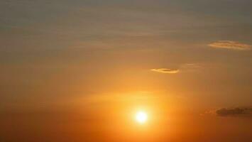 Beautiful sunset with clouds and orange sky. photo