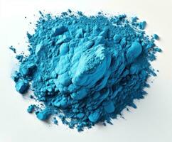 AI generated Blue holi powder against white backdrop, holi festival image download photo