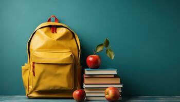 AI generated Yellow backpack apple and books on a bright blue wall, educational photo