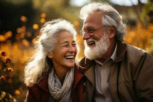 AI generated Elderly couple joyful pose on a grey wall, active seniors lifestyle images photo