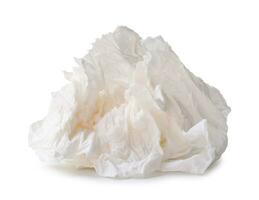 Single screwed or crumpled tissue paper or napkin in strange shape after use in toilet or restroom isolated on white background with clipping path photo