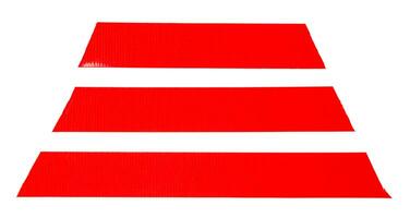 Red adhesive vinyl tape stripes in set isolated on white background with clipping path. Top view and flat lay photo