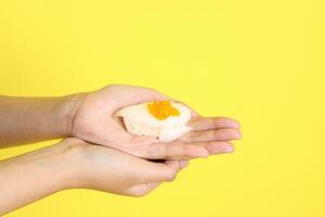 Hand with Sushi photo