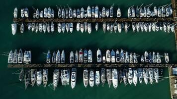 Aerial top down view of a yacht club with sailboats video