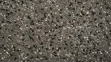 AI generated Top view of Chia seeds. Background texture of raw Chia seeds. Superfood. Copy space. Banner. Perfect for culinary and food concepts. photo
