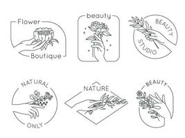 Line hand and flower logos. Floral beauty salon, spa and cosmetics logo with woman hands. Emblems for natural handmade products, vector set