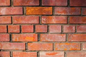 Old of concrete orange color blocks wall texture background photo