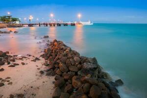 Landscape view of beadh at night time photo