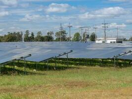 Farm of solarcell againts sky photo