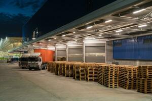 Truck is carrying container parking in front warehouse photo