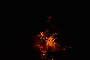 Burning of rice straw at night. photo