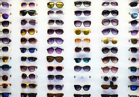 Sunglasses on the shop window photo