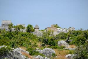 ruins of the ancient city of Kekova on the shore. photo