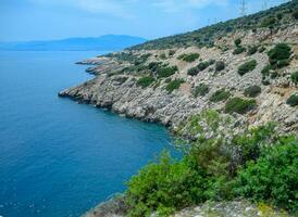 coast of the Mediterranean Sea. The shore is composed of limestone and marble. photo