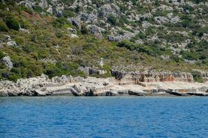 ruins of the ancient city of Kekova on the shore. photo