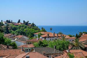 View from the observation deck on the roofs of the old buildings of the old city of Kaleici in Antalya, Turkey. photo