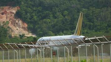 Plane of Tigerair take of at Phuket Airport video