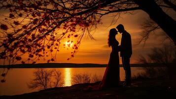 AI generated Silhouette of a young couple in love on the background of a beautiful sunset photo