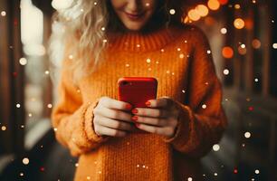 ai generado recortado Disparo de joven mujer en suéter utilizando teléfono inteligente a Navidad foto