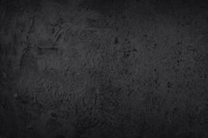 Dark grey black slate texture with high resolution, background of natural black stone wall. photo