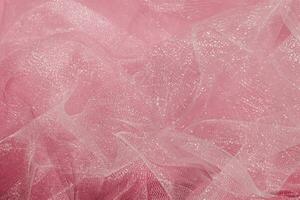 Pink tulle fabric texture top view. Coral background. Fashion color trends feminine tutu skirt flat lay for female blog. photo