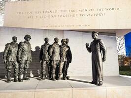 Washington, DC, USA - 12.12.2023 Dwight David Eisenhower Memorial, Statue of Eisenhower with an inscription of his D-Day Speech photo