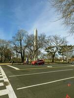 Washington, DC, USA - 12.16.2023 Washington Monument against a cloudy sky. photo