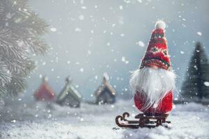 a Christmas gnome on a sled in the snow. New Year's, Christmas background photo