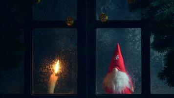 Christmas, winter composition. Christmas Gnome and Candle photo