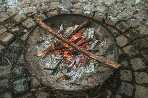 fire campfire bowl outdoors in winter. cozy atmosphere photo