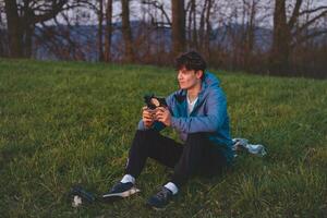 Young cinematographer shoots parts of a film using a technological product called a drone. Recording the sunset from an aerial view photo