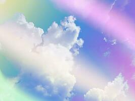 beauty abstract sweet pastel soft violet and yellow with fluffy clouds on sky. multi color rainbow image. fantasy growing light photo