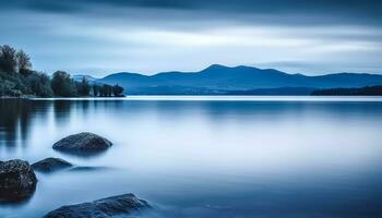 ai generado suave azul agua refleja tranquilo montaña paisaje generado por ai foto