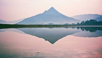 AI generated Majestic mountain peak reflects tranquil sunset over water generated by AI photo