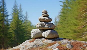 AI generated Stacked rock cairn balances on top of mountain generated by AI photo