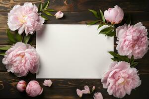 AI generated mockup white blank paper sheet with beautiful peonies top view on wooden background, template empty card flat lay for design with copy space photo