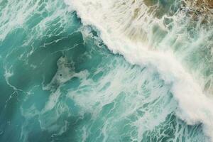 ai generado aéreo ver de mar playa ola, Oceano olas en el playa como un fondo de pantalla fondo, mar con azul agua olas ai generado foto