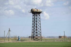 Rusty water tower photo