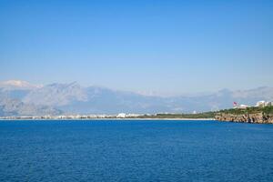 The coastline of Antalya, the landscape of city of Antalya is a view of the coast and the sea. photo