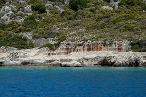 ruins of the ancient city of Kekova on the shore. photo