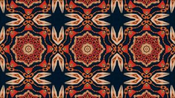 The animated kaleidoscope background with bright orange geometric abstract shapes on a dark blue background. video