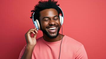 AI generated happy joyful african man wearing headphone listening to music isolated on pink background photo