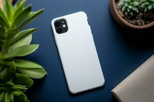 AI generated Blank white phone case mockup on dark blue desk. Top view photo