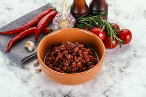 Red canned beans in the bowl photo