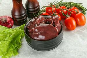 Raw turkey liver in a bowl ready for cooking photo