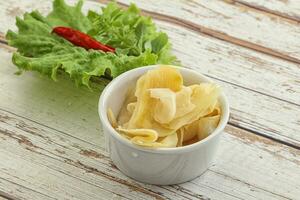 Marinated white ginger in the bowl photo