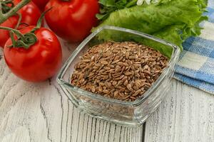 Dry Raw flax seed in the bowl photo